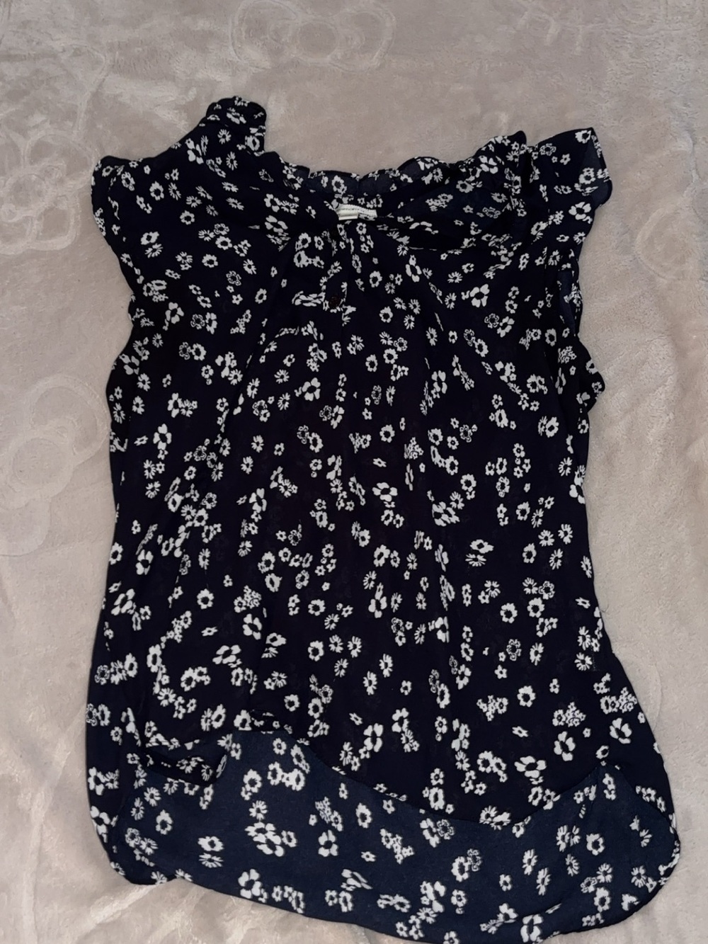 Navy blue blouse with white floral print